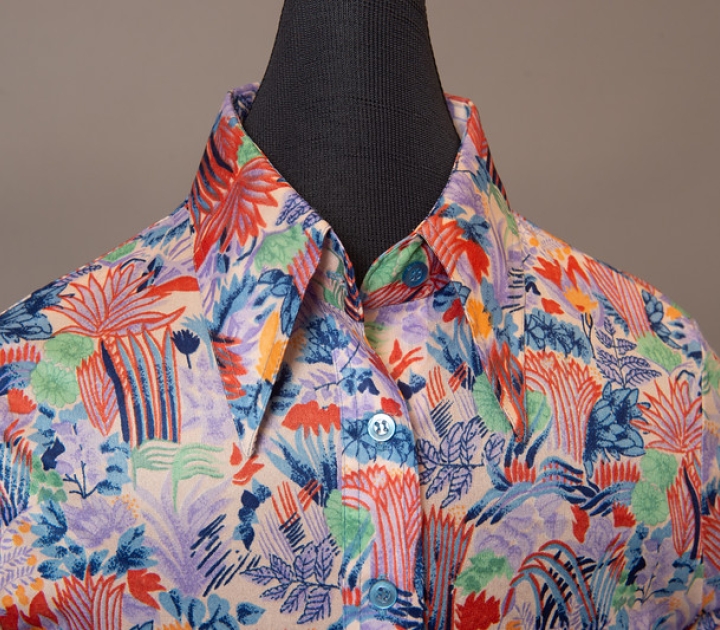 Detail of multicolored print button down shirt