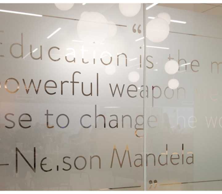 Inscription on window in Butler Library that shows a quote from Nelson Mandela that reads "Education is the most powerful weapon we can use to change the world."