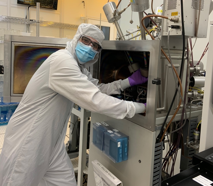 Joseph Wikar working in the clean room at the Center for Nanoscale Science and Technology