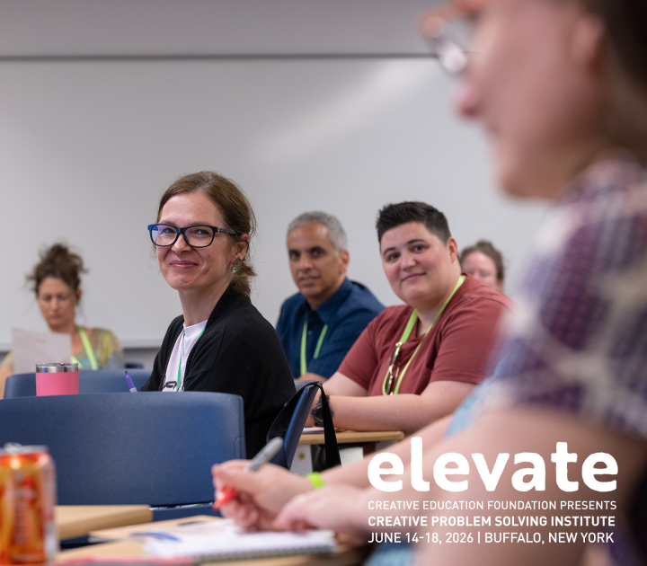 People sitting in classroom smiling