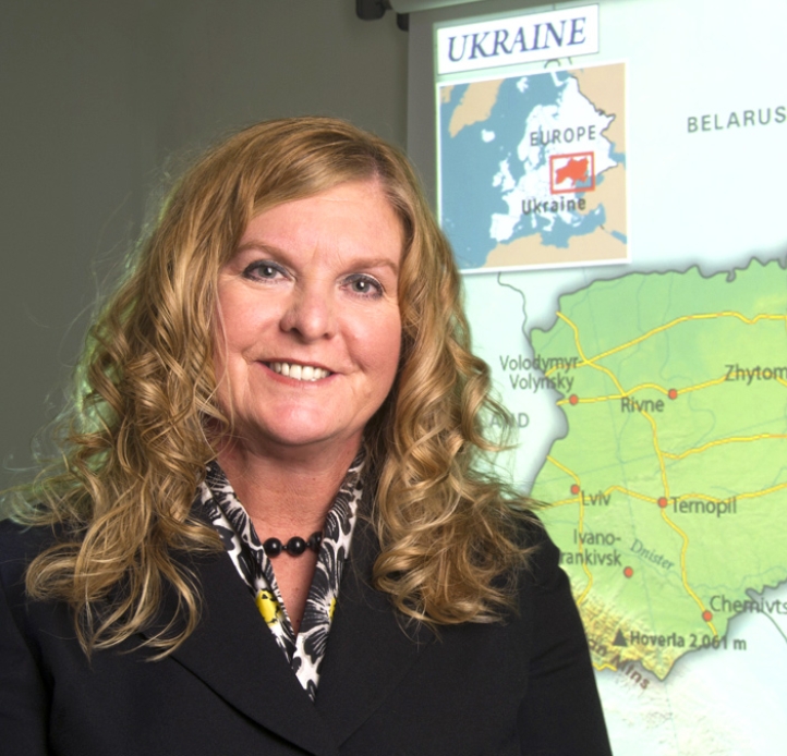 Kimberly A. Kline in front of map of Ukraine