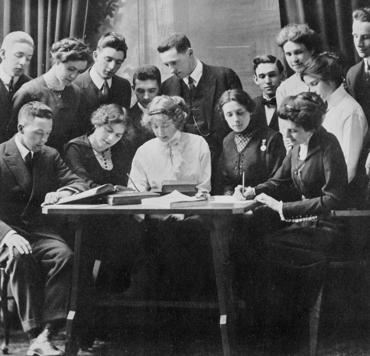 Historical images of students at a table