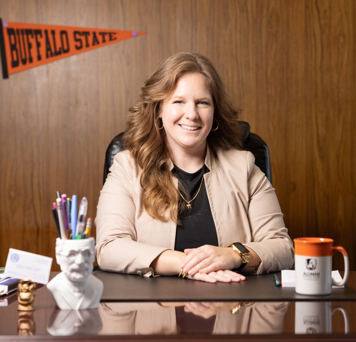 Sarah Bonk sitting at her desk
