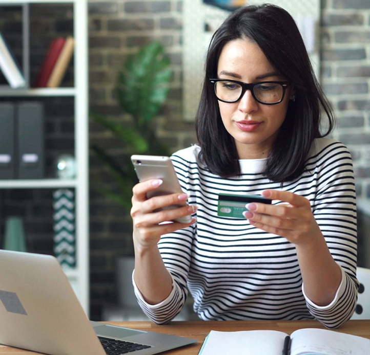 Woman paying with a credit card
