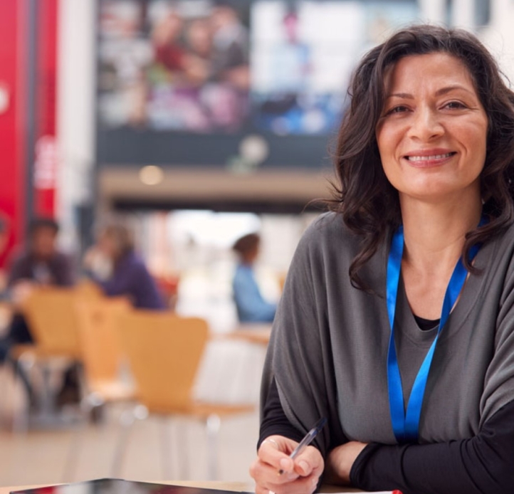 Smiling woman sitting at a table
