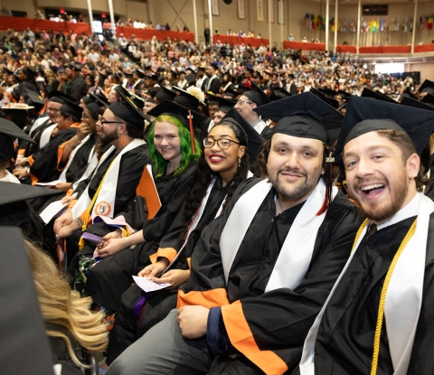 Group of graduates at commencement in the Sports Arena