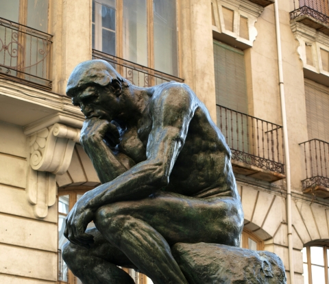 Statue of a man thinking