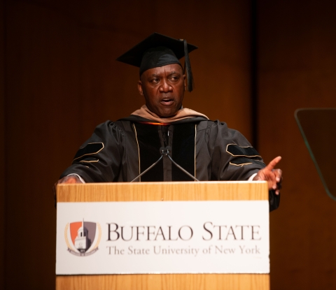 Thurman Thomas at the podium at Honors Convocation