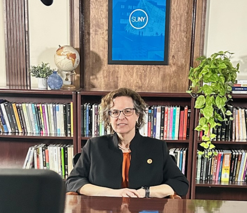 Dr. Burris at desk