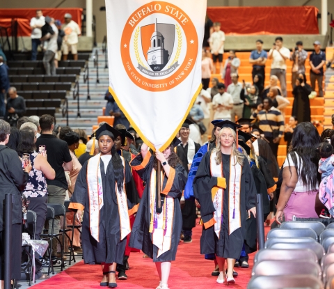 Student marchers processing into Commencement