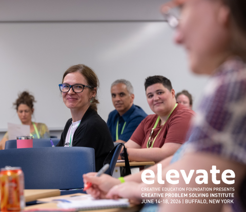 People sitting in classroom smiling