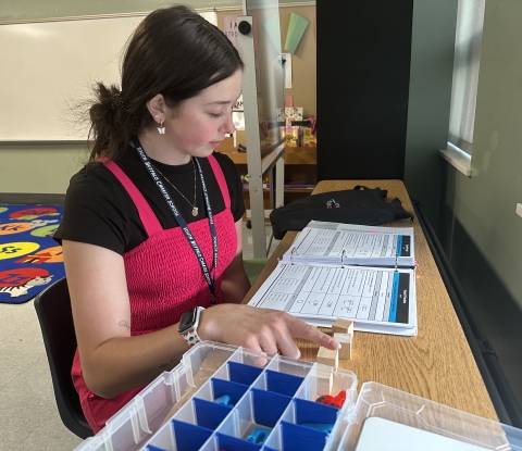 Callan Barber working with reading materials