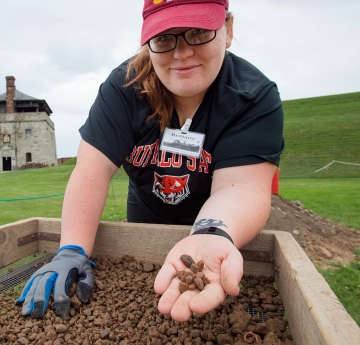 Student at an archeological dig