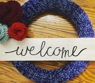 Knitted welcome wreath
