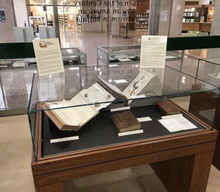 Galileo text under museum glass