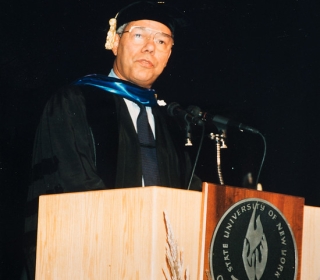 Colin Powell receiving honorary doctorate at Buffalo State Acadademic Convocation cerermony 1998