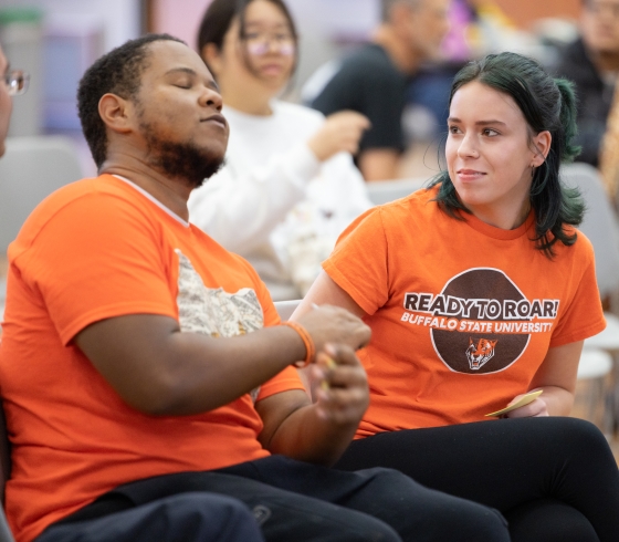 Two students at the festival