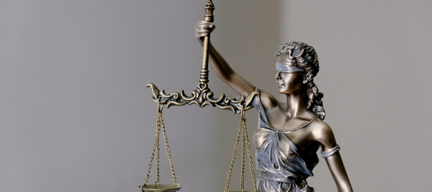 Scales of justice statuette