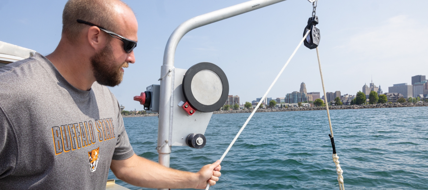 Brian Haas operating equipment on the water