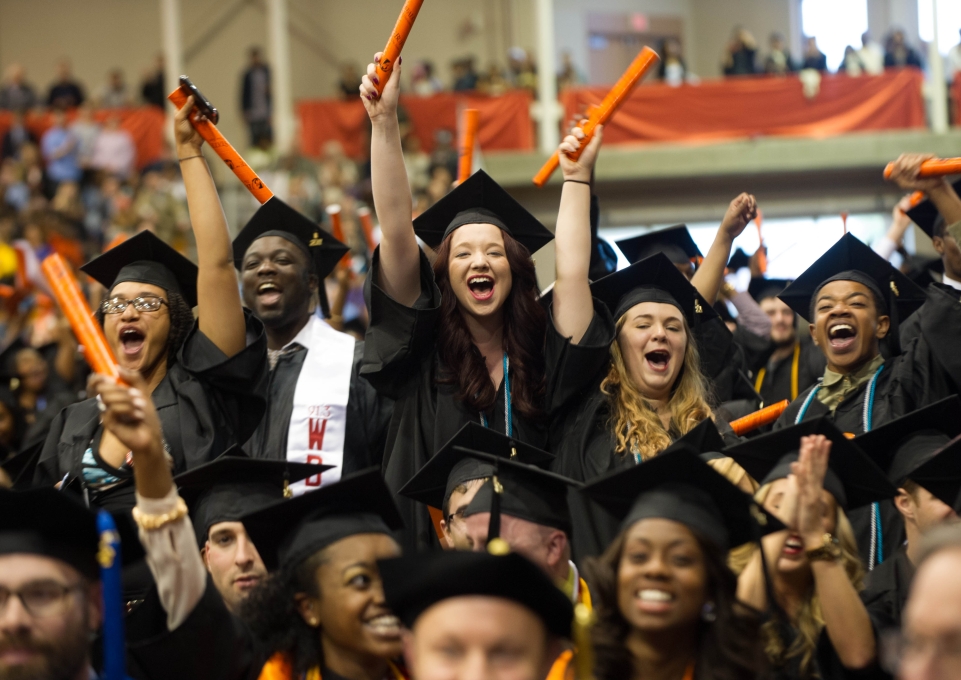 Students cheering at commencement