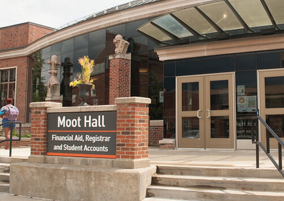 Exterior of Moot Hall showing Financial Aid sign