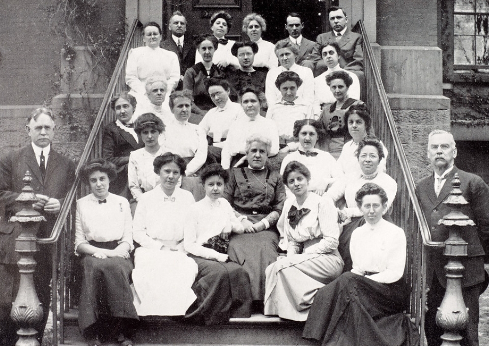 Group shot of faculty members on the steps of the first normal school, 1913