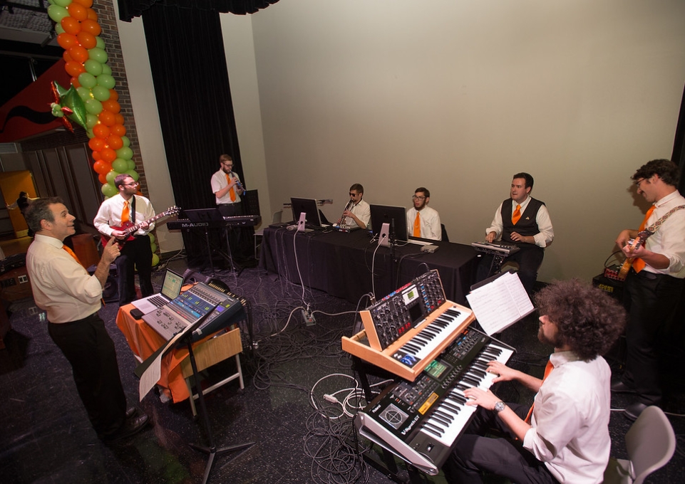 Digital Music Ensemble, led by Tomas Henriques (left), performing at the Transforming Lives Campaign closing ceremony celebration at Buffalo State College in 2015