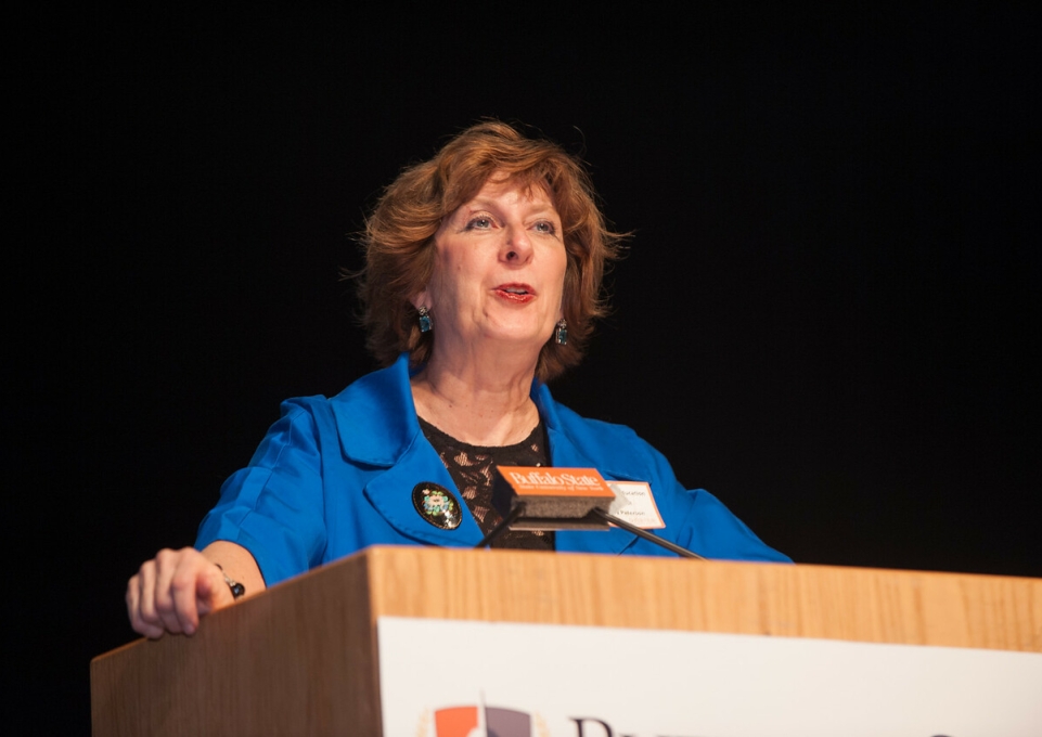 Wendy Paterson speaking at a lectern