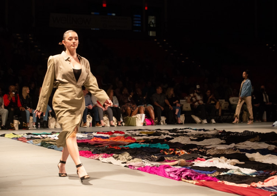 Model walks the runway at Buffalo State fashion show 2022