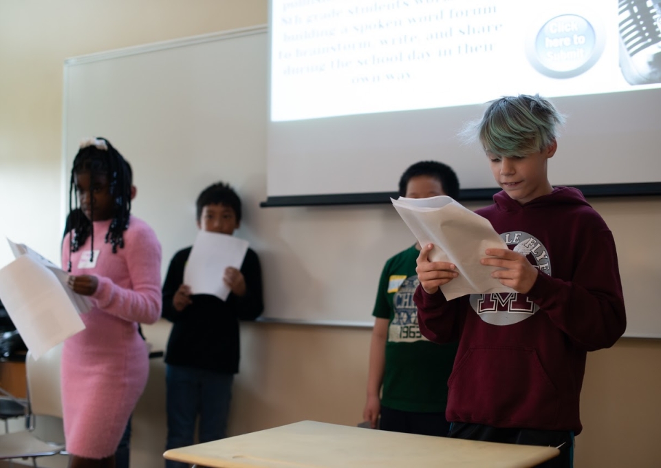 Students read from their work at the Youth Voices Conference