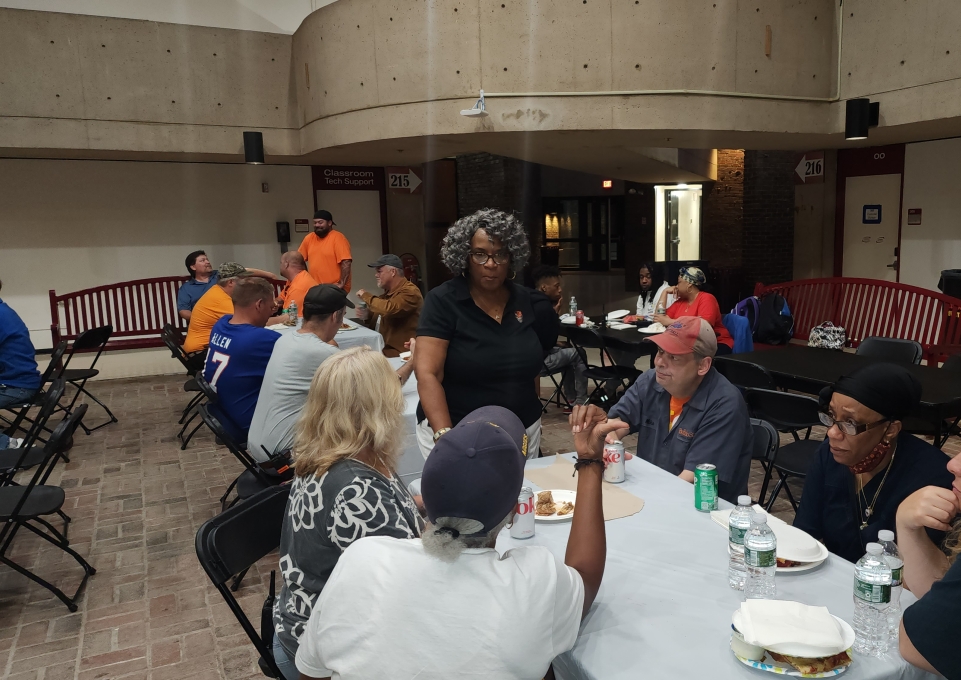 Interim President Bonita R. Durand meets with Buffalo State University staff at the annual Second and Third Shift Pizza Party.