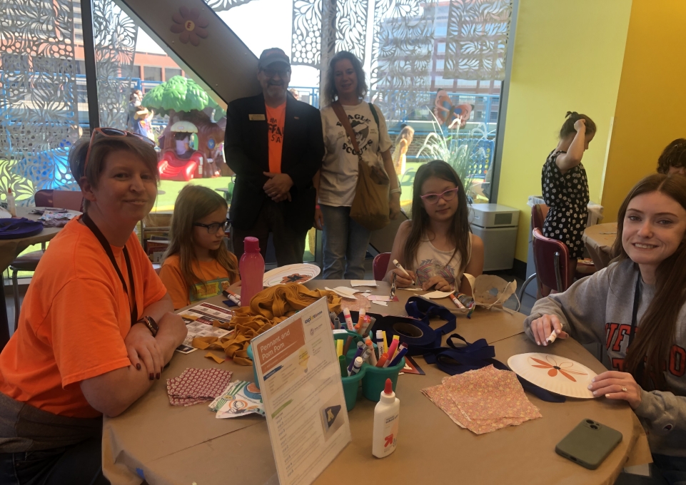 A group of Buffalo State representatives with students at Explore & More