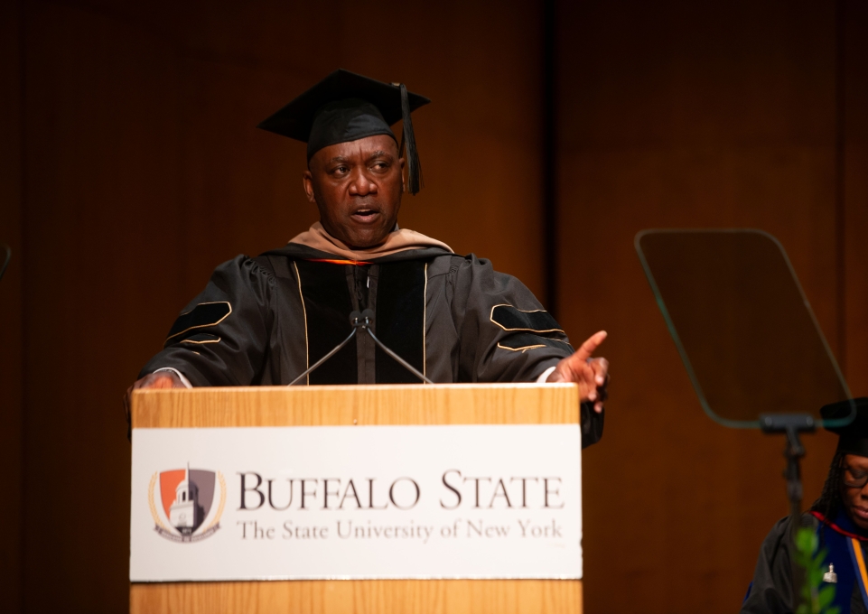 Thurman Thomas at the podium at Honors Convocation
