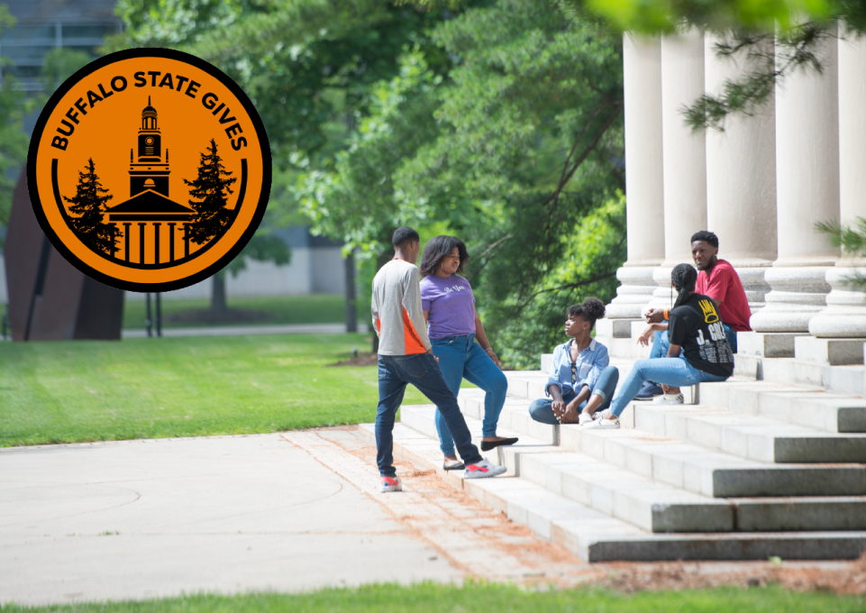 Students sitting on steps of Rockwell Hall with Buffalo State Gives logo displayed