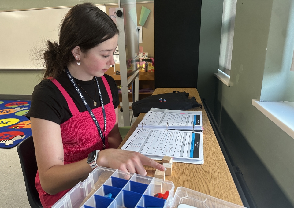 Callan Barber working with reading materials